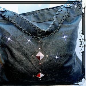 Black..  Sassy..  Hand bag..